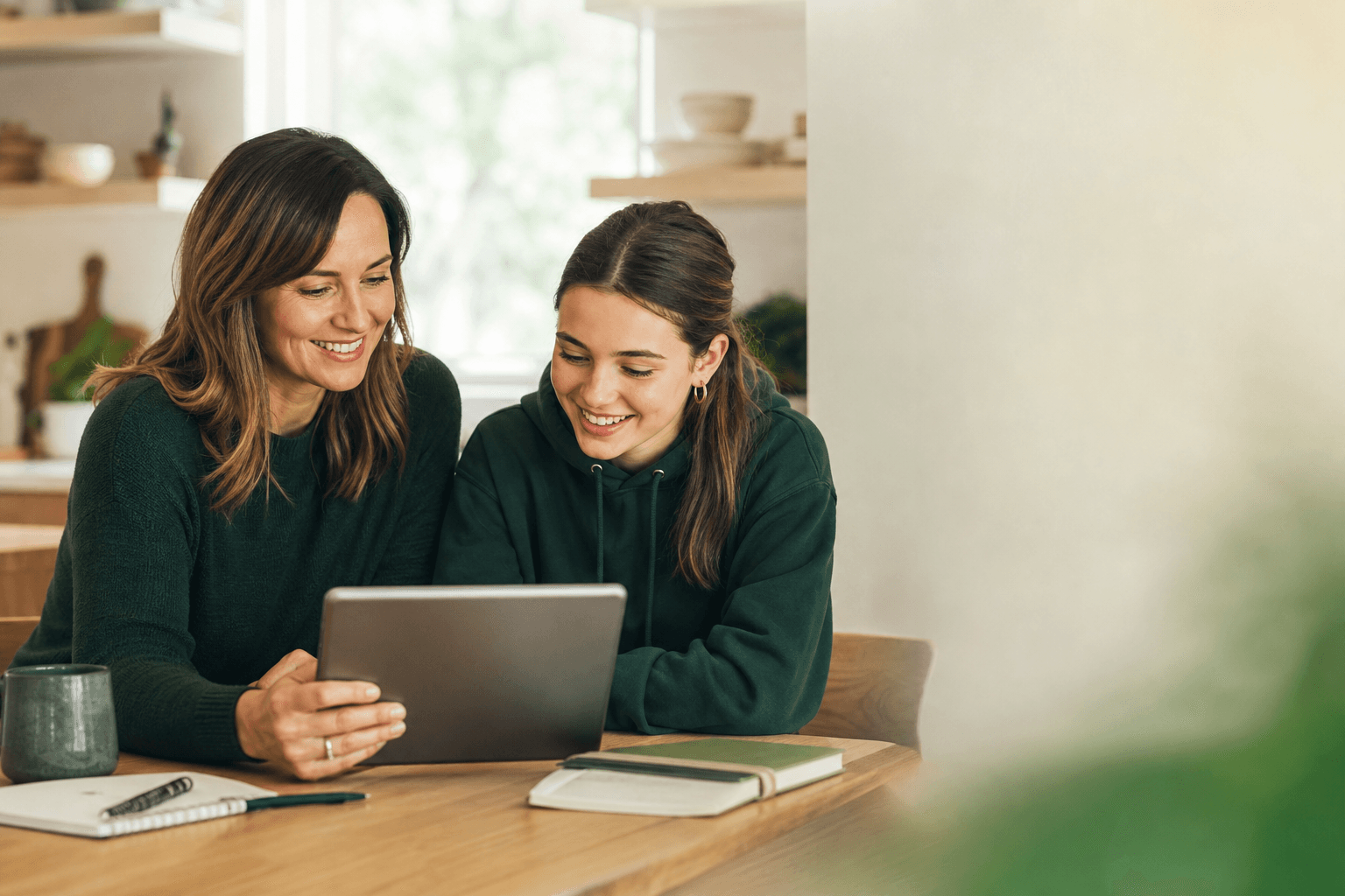 Parent and child discussing school preferences together